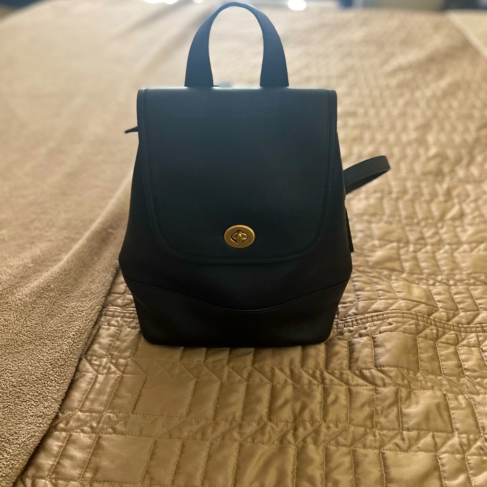 Coach turn lock backpack